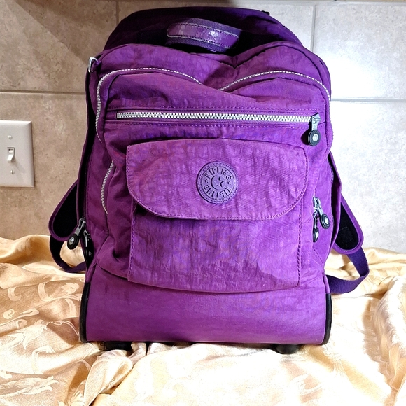 Kipling Bags Kipling Purple Rolling Backpack With Pull Out Handle